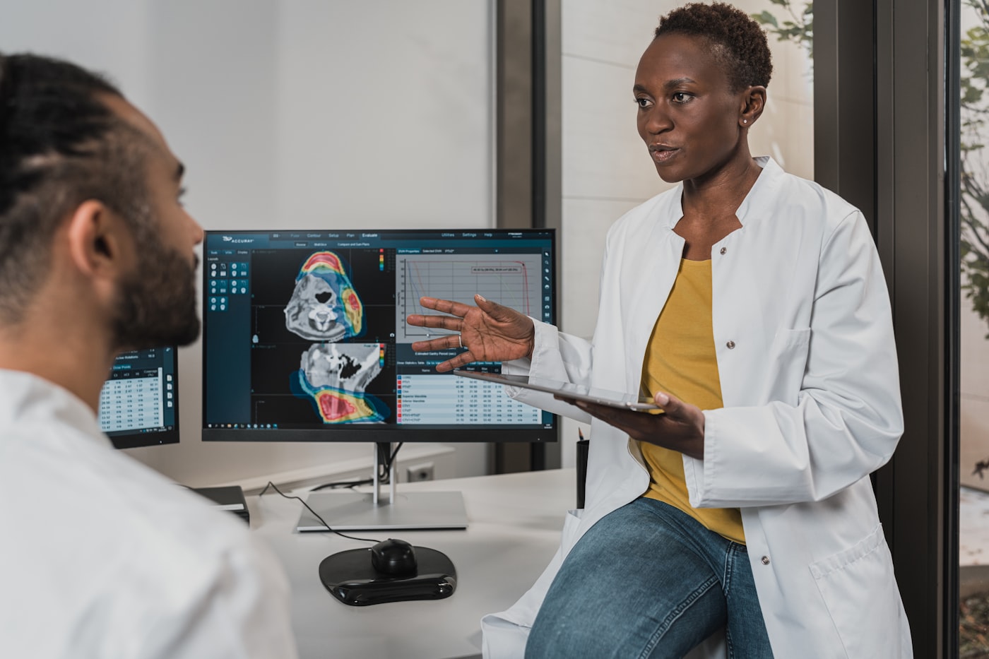 Clinicians reviewing medical imaging